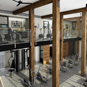 two story fitness center with multiple cardio options, yoga and weights